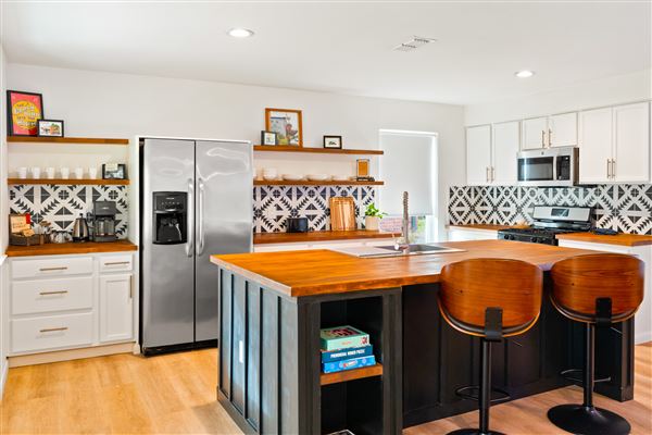 Suburban Home with Chef's Kitchen, Large Backyard, Open Plan Living